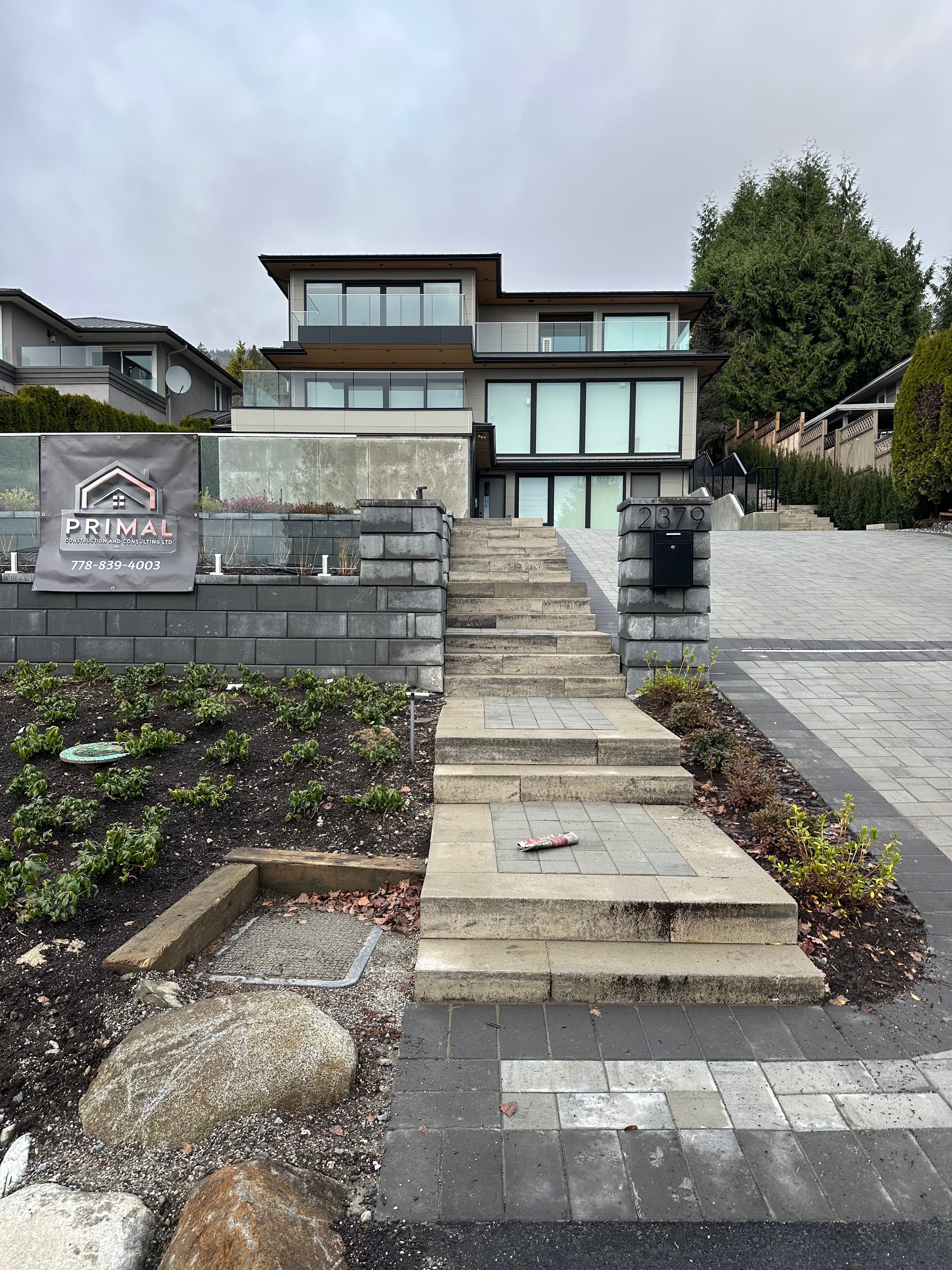 Nelson House 2 — terraced entry stairs and stone retaining walls