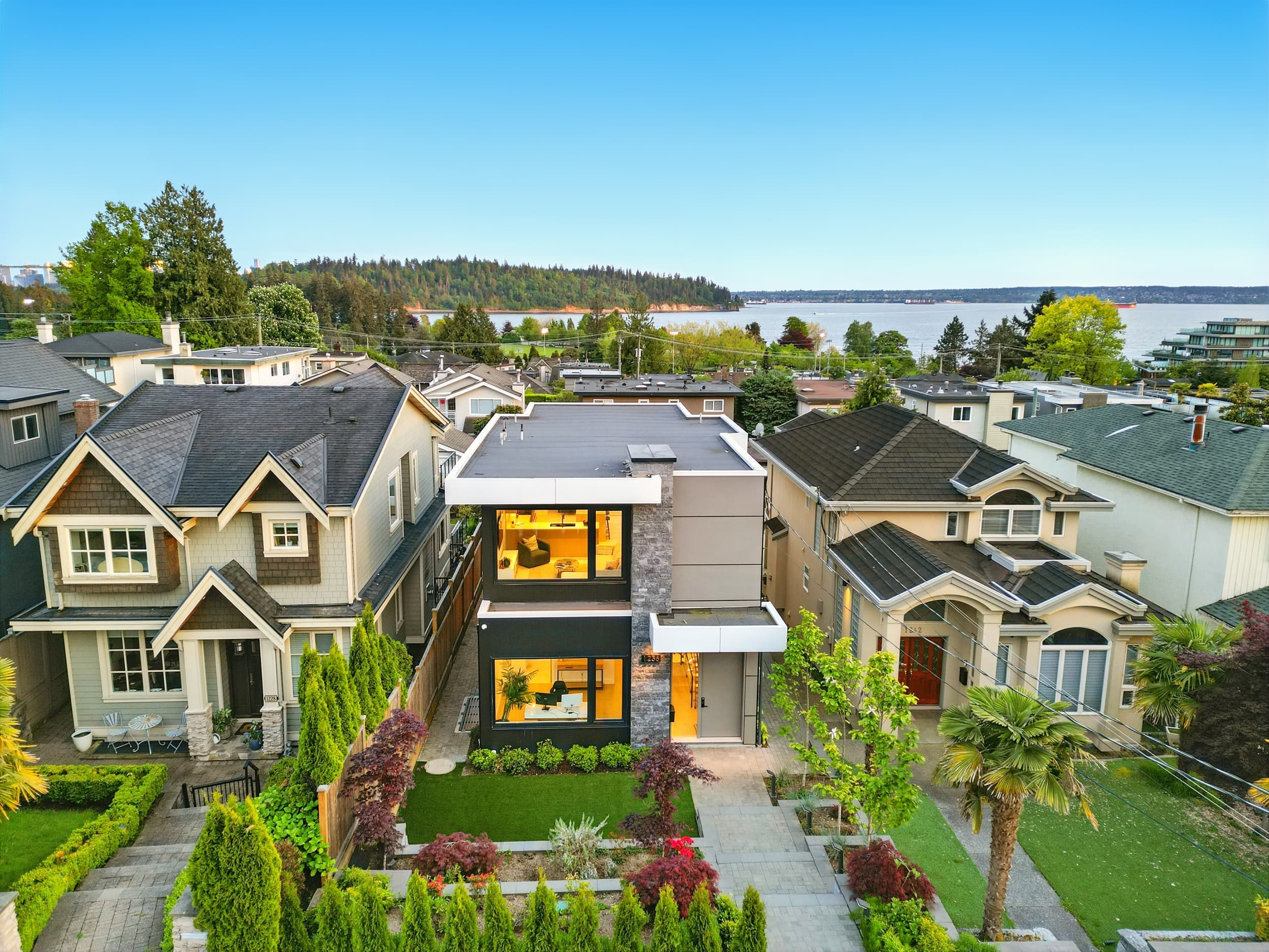 Duchess House — daytime aerial with mountain backdrop