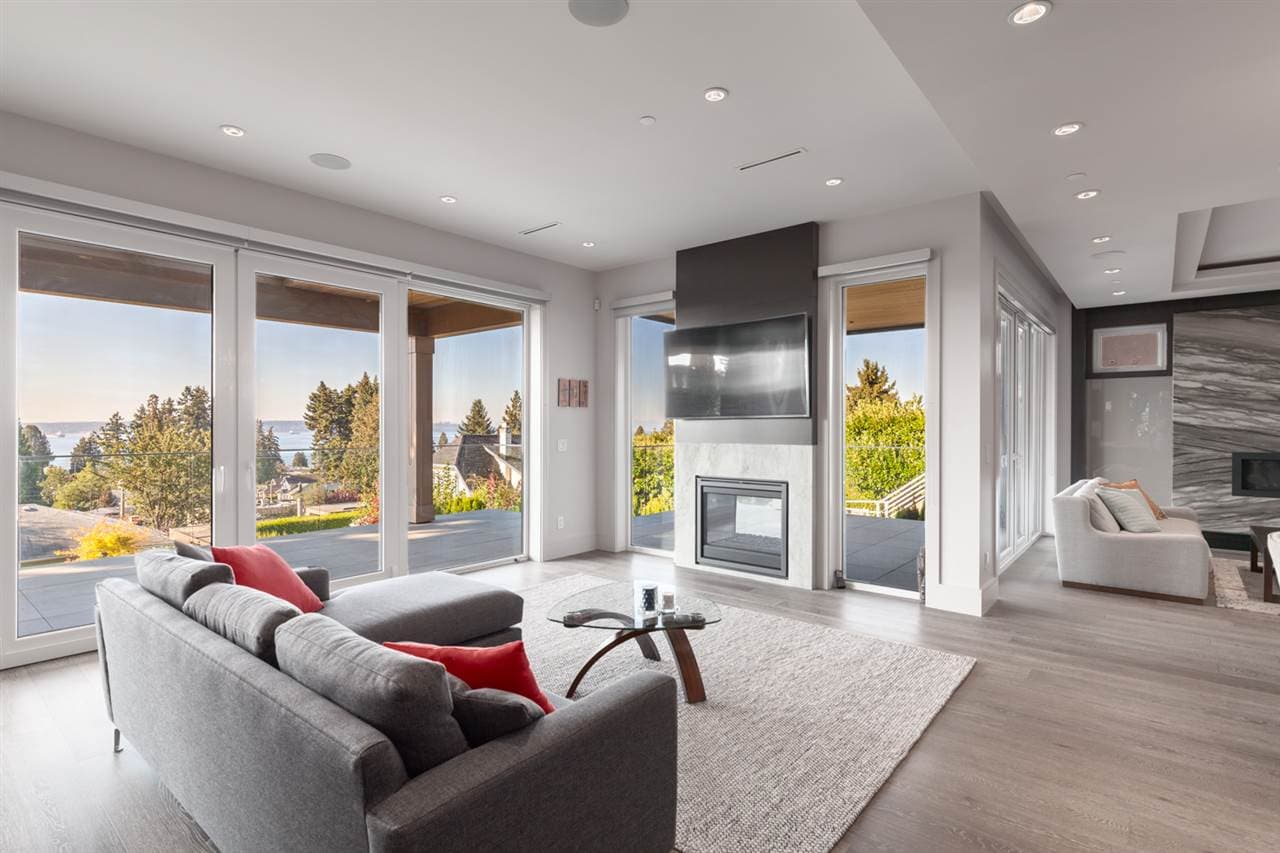 Nelson House — living room with ocean view and fireplace
